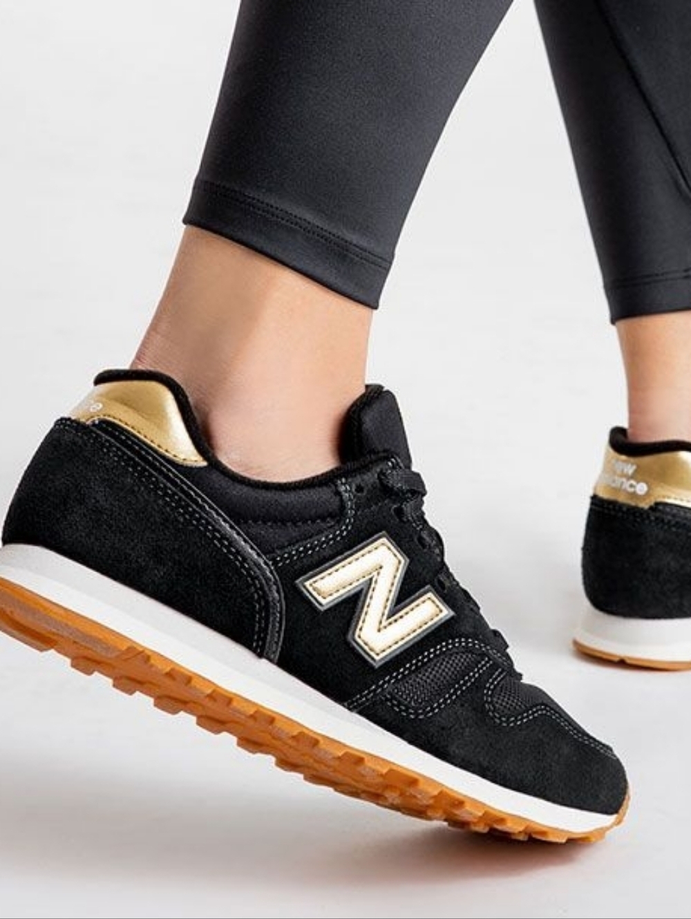 New Balance Women’s Suede Sneakers Black with Gold